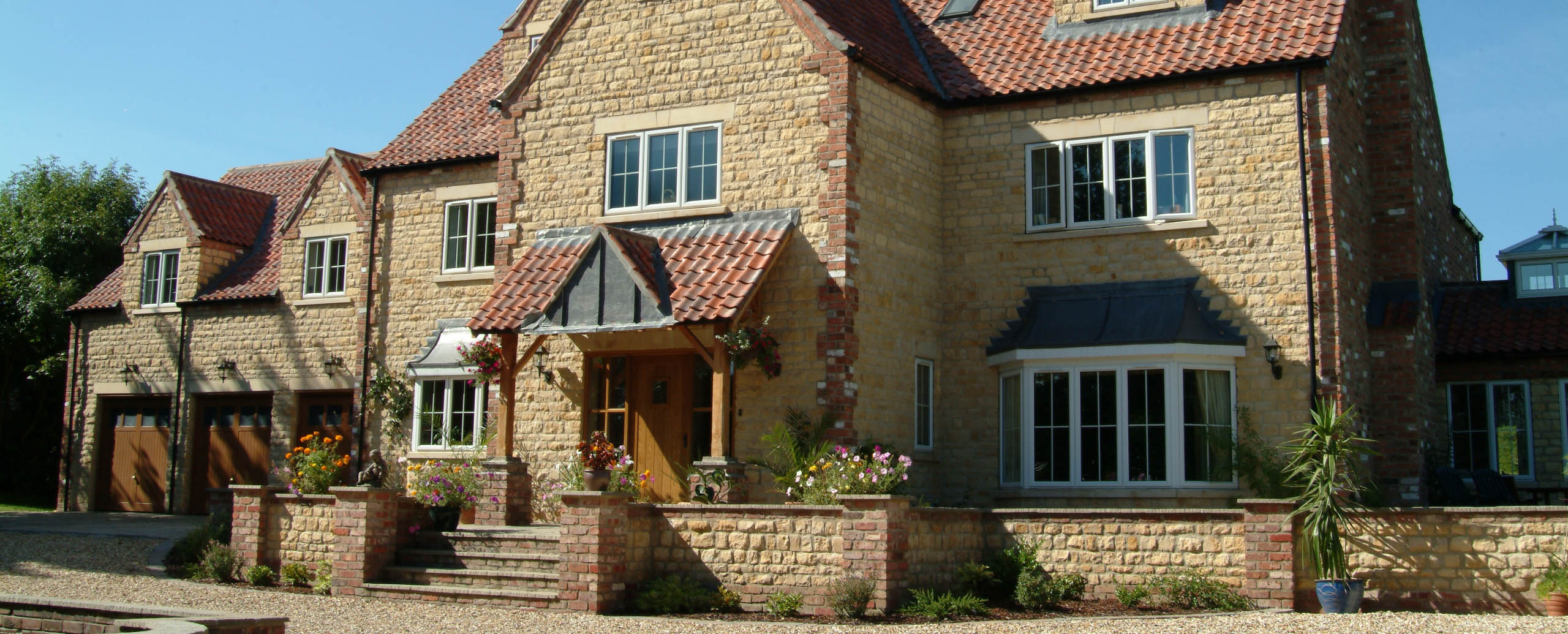 large house with multiple white windows