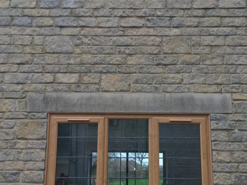 two wood effect upvc windows