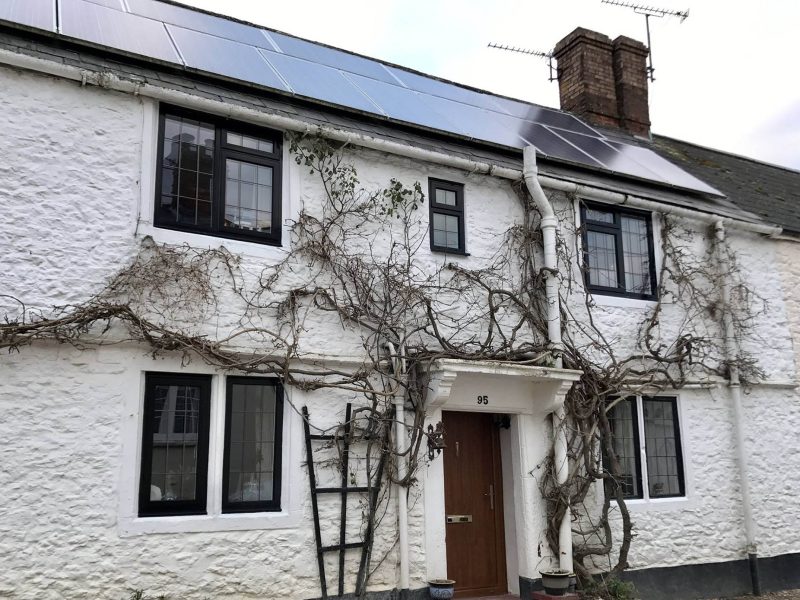 white house with black windows