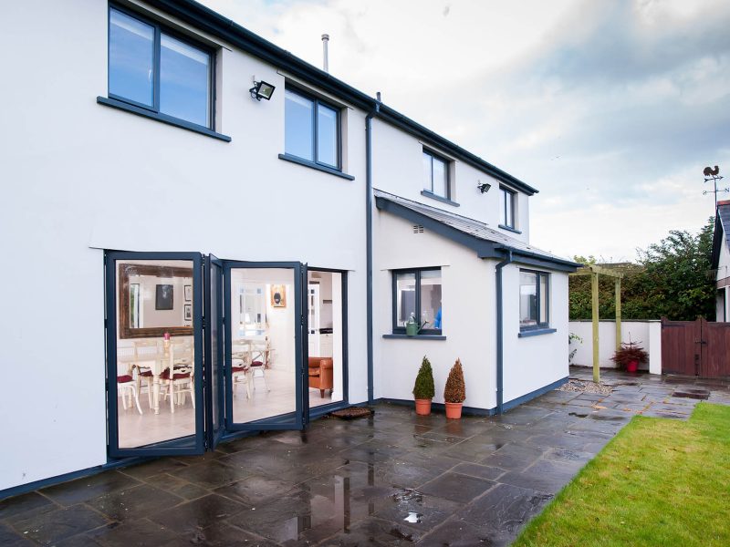 house with black bifold doors