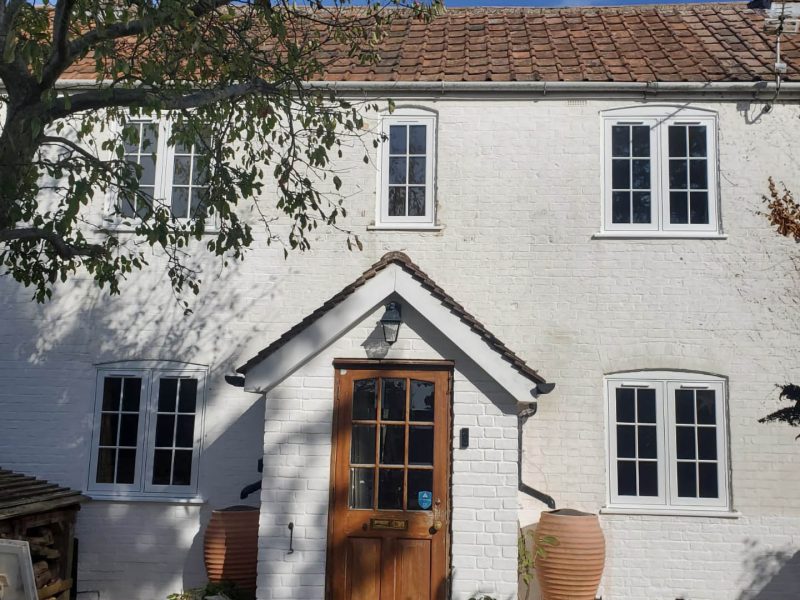 large white house with a brown front door