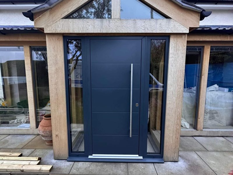 blue door with large silver pull handle