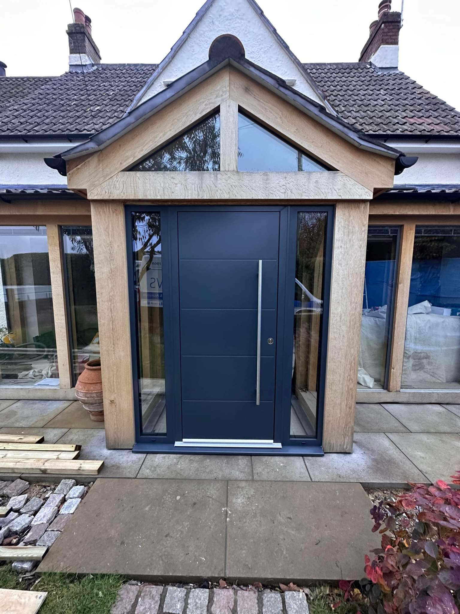 blue door with large silver pull handle