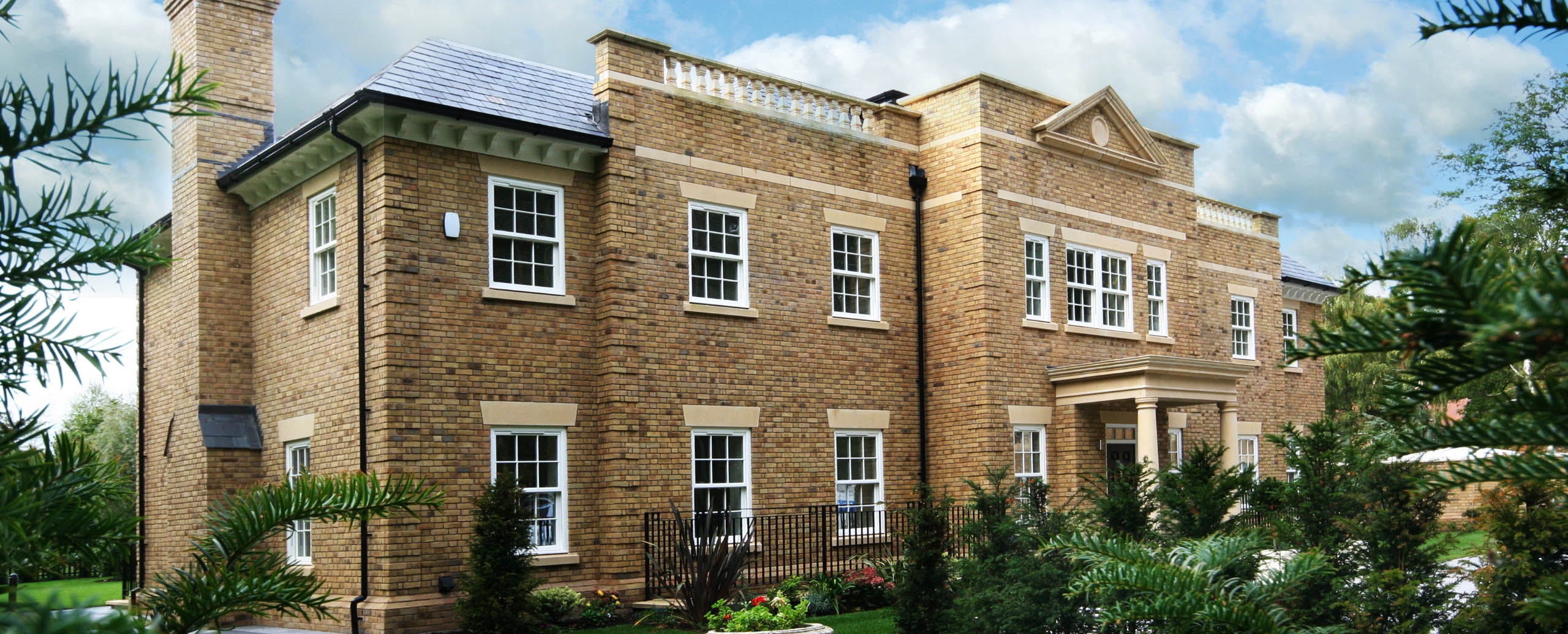 large house with sliding sash windows