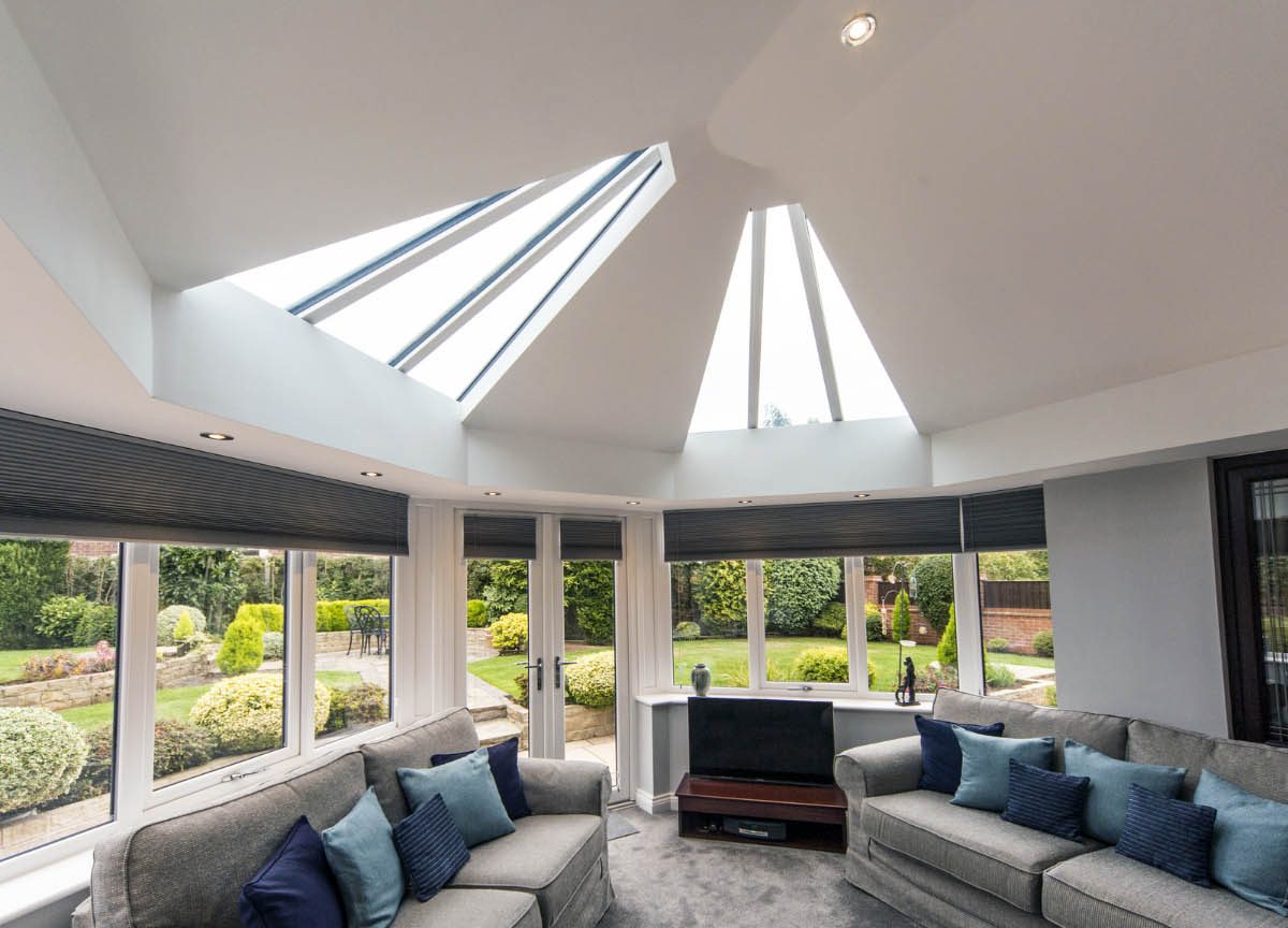 large conservatory with a solid roof