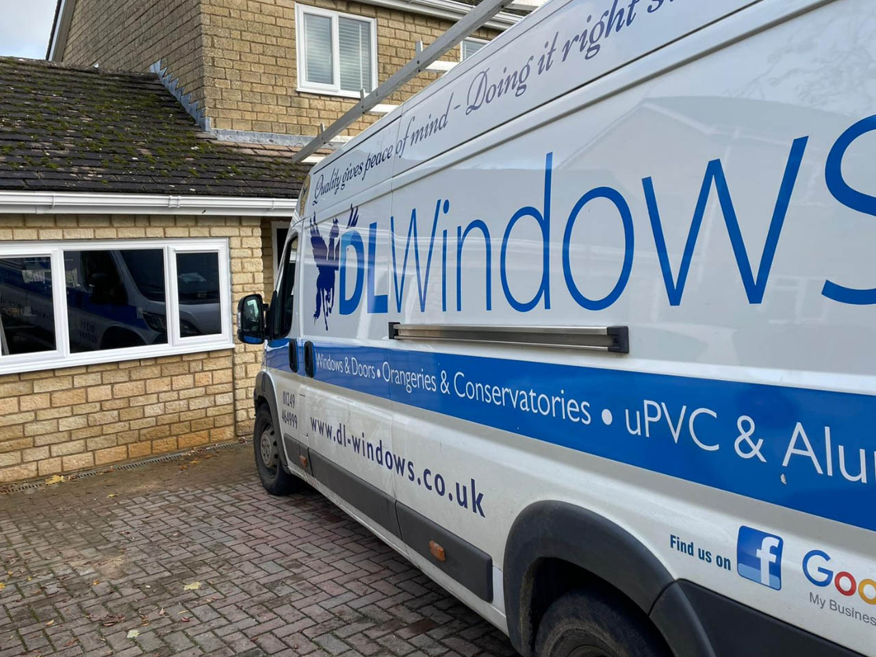 DL Windows van parked by white upvc windows