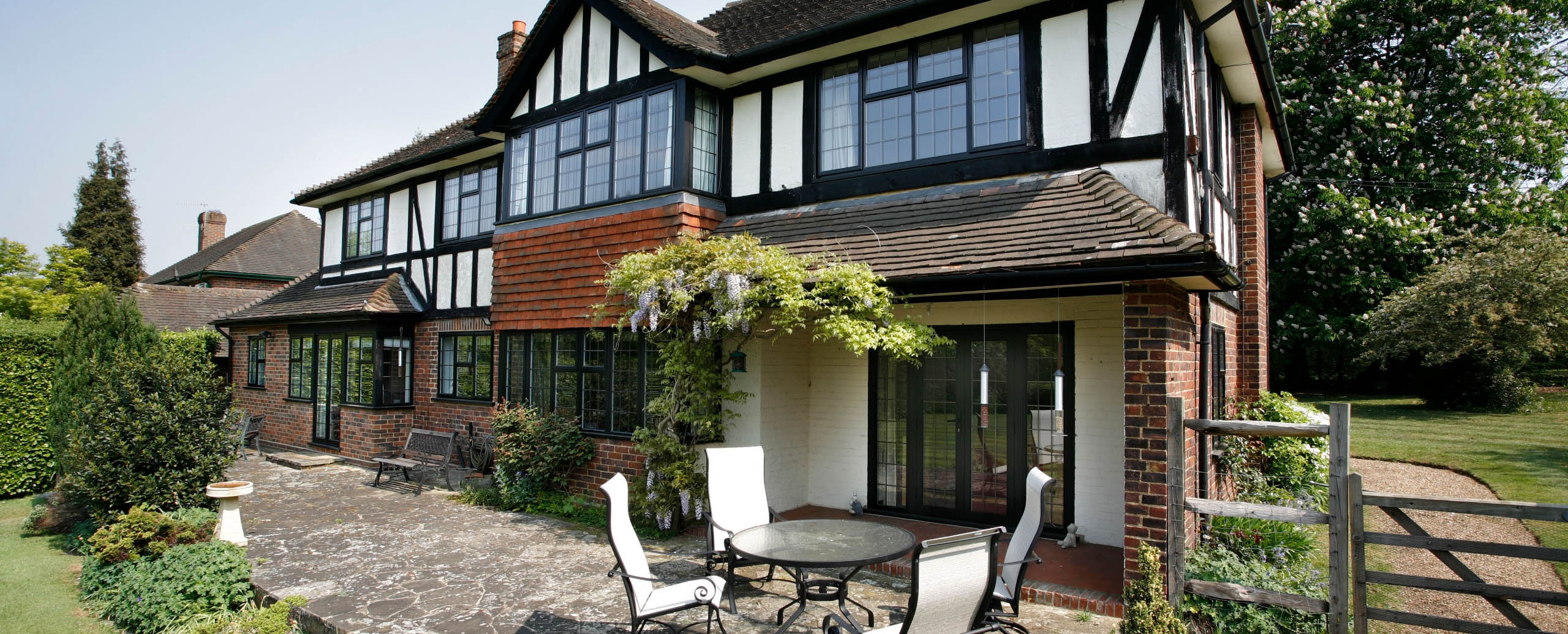 tudor-style house with double glazed tilt and turn windows